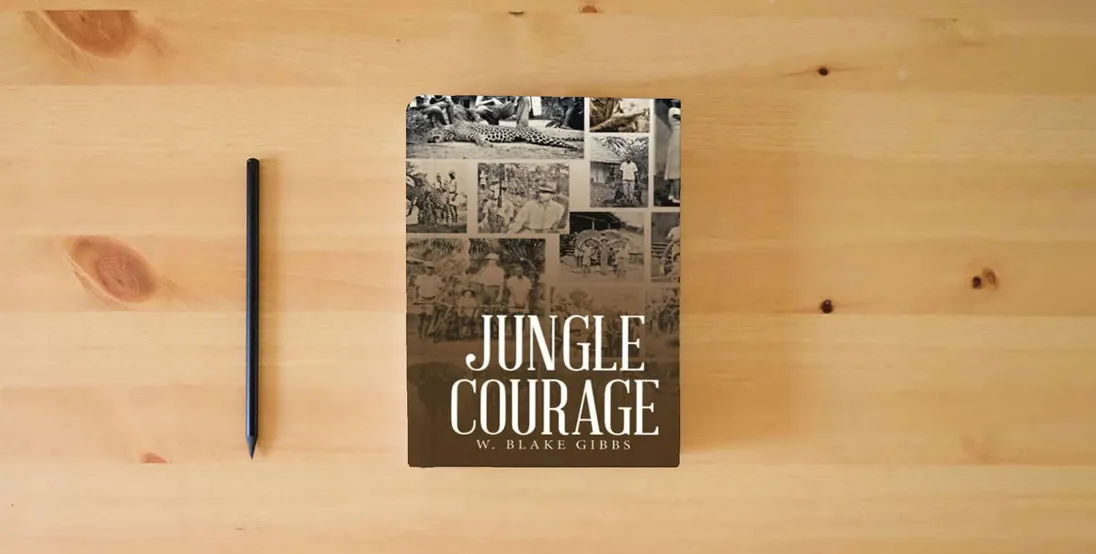 The book JUNGLE COURAGE} is on the table