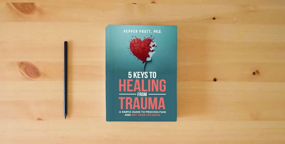 The book 5 Keys to Healing From Trauma: a simple guide to process pain and get your life back} is on the table