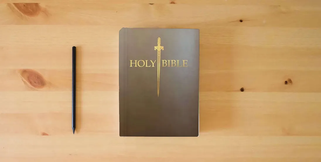 The book KJV Sword Bible, Large Print, Coffee Ultrasoft: (Red Letter, Brown, 1611 Version) (King James Version Sword Bible)} is on the table