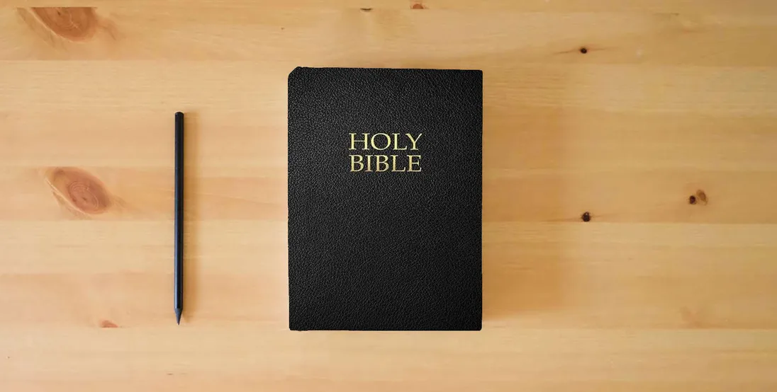 The book KJVER Gift and Award Holy Bible, Black Ultrasoft: (King James Version Easy Read, Red Letter)} is on the table