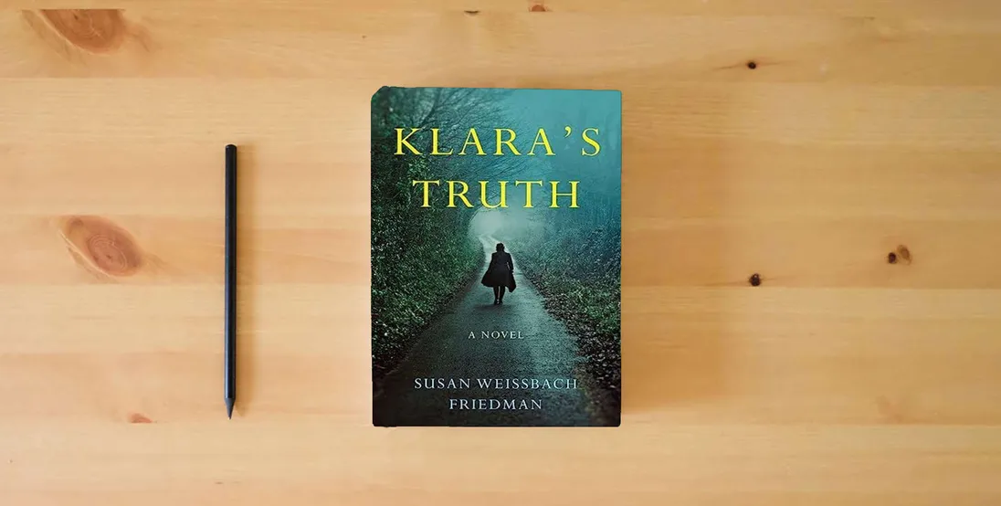 The book Klara's Truth: A Novel} is on the table