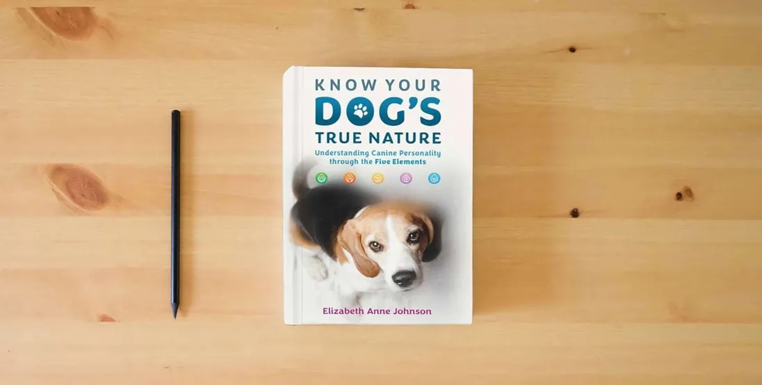 The book Know Your Dog's True Nature: Understanding Canine Personality through the Five Elements} is on the table