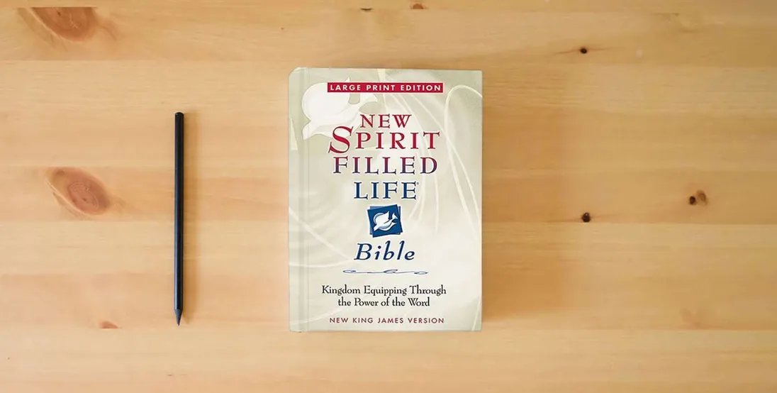 The book Large Print New Spirit Filled Life Bible} is on the table