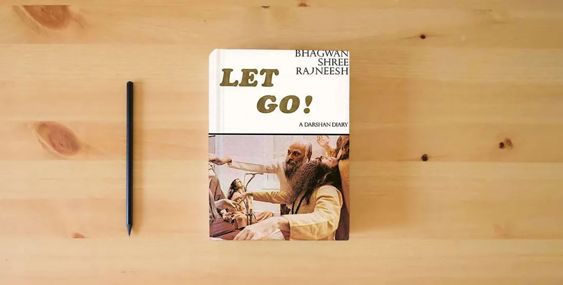 The book Let Go! A Darshan Diary} is on the table