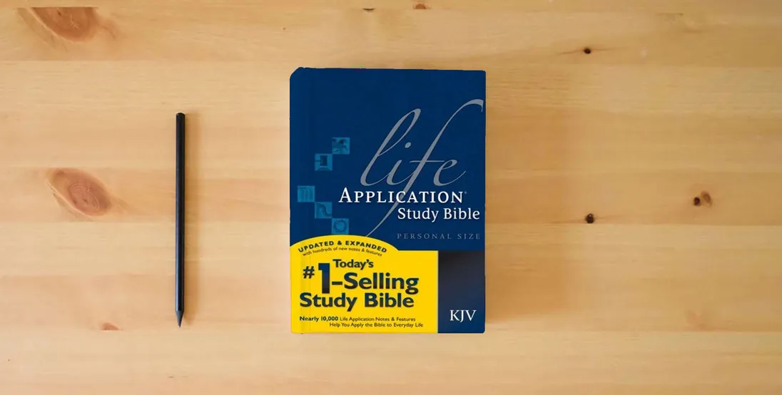 The book Life Application Study Bible KJV, Personal Size} is on the table
