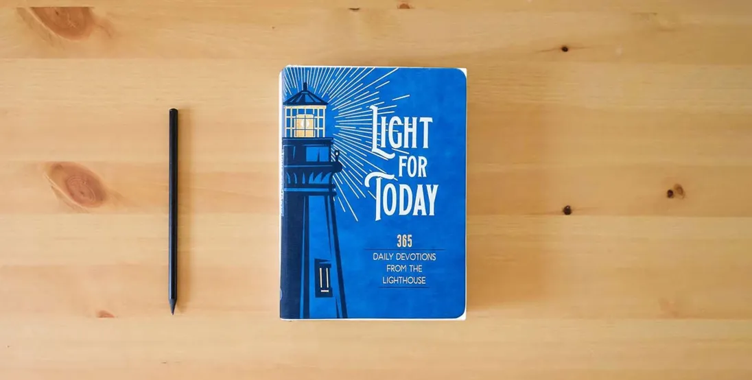 The book Light for Today: 365 Daily Devotions from the Lighthouse – Hope and Wisdom for Life} is on the table