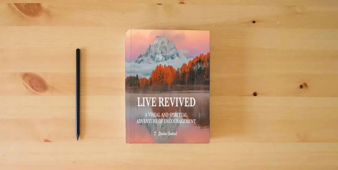 The book Live Revived} is on the table