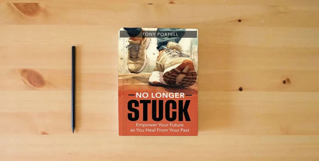 The book No Longer Stuck: Empower Your Future as You Heal From Your Past} is on the table