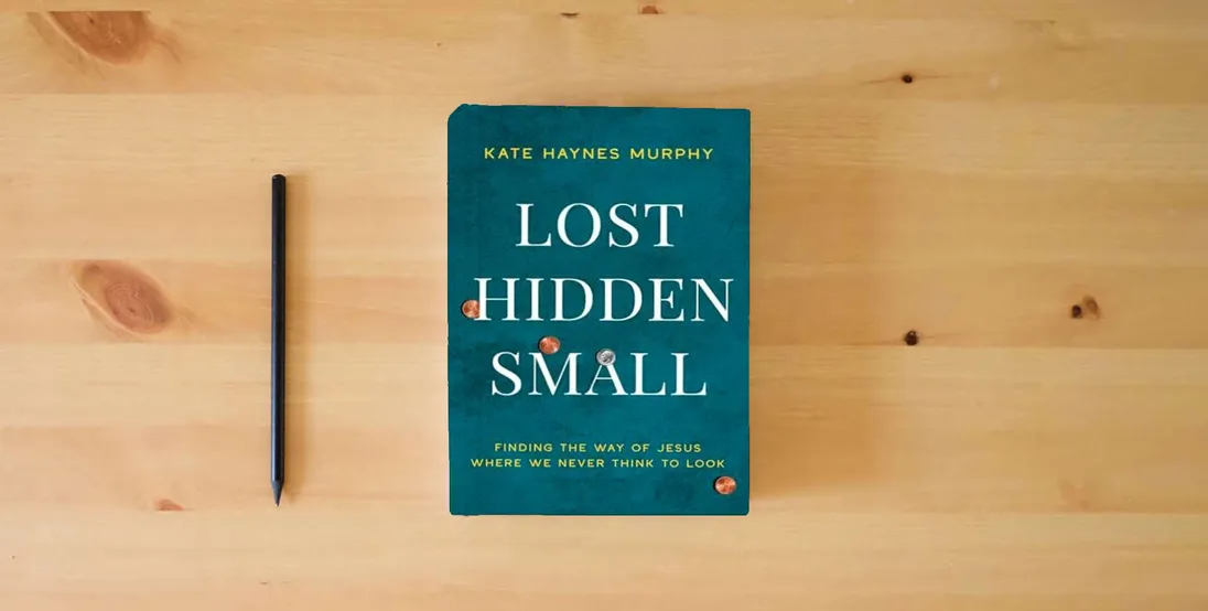 The book Lost, Hidden, Small: Finding the Way of Jesus Where We Never Think to Look} is on the table