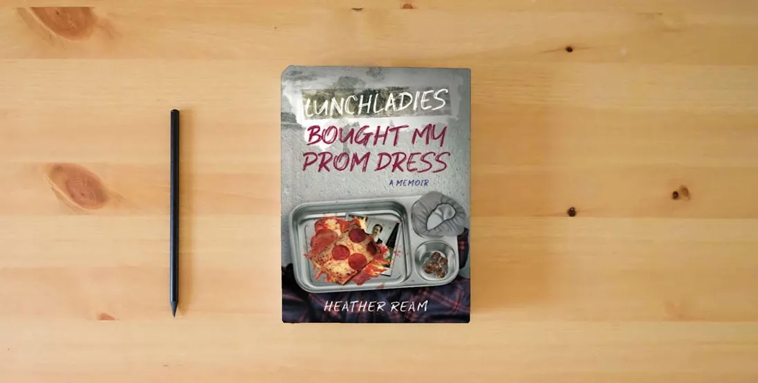 The book Lunchladies Bought My Prom Dress} is on the table