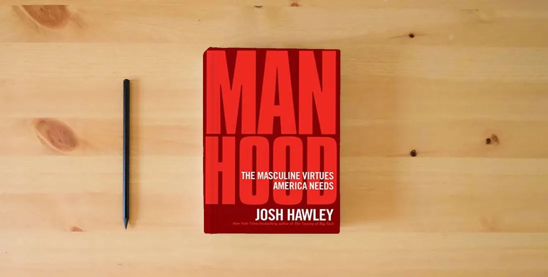 The book Manhood: The Masculine Virtues America Needs} is on the table