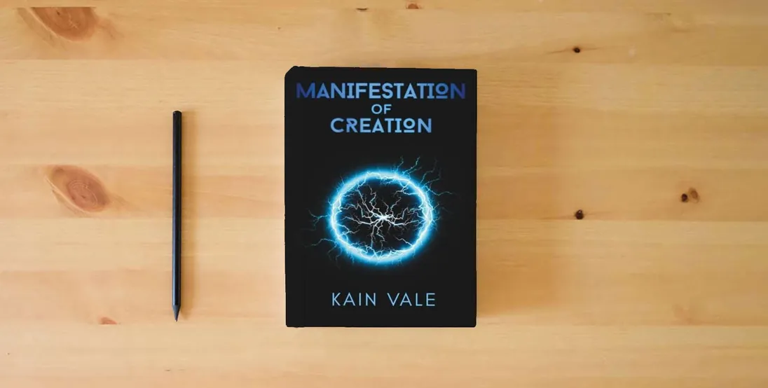The book Manifestation of Creation} is on the table