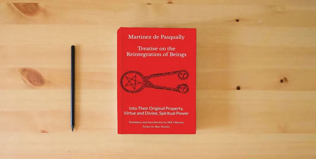 The book Martinez de Pasqually - Treatise on the Reintegration of Beings Into Their Original Property, Virtue and Divine, Spiritual Power (The Élus Coëns Collection)} is on the table