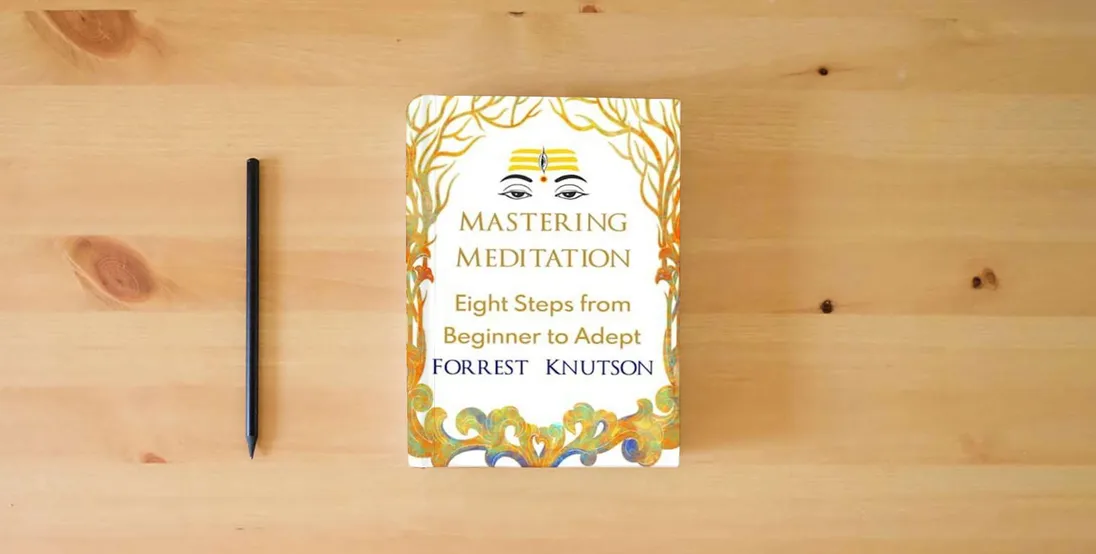 The book Mastering Meditation: Eight Steps From Beginner to Adept} is on the table