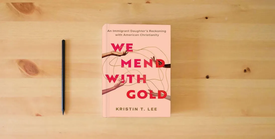 The book We Mend with Gold: An Immigrant Daughter's Reckoning with American Christianity} is on the table