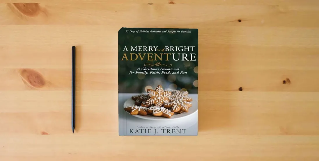 The book A Merry and Bright Adventure: A Christmas Devotional for Family, Faith, Food, and Fun} is on the table