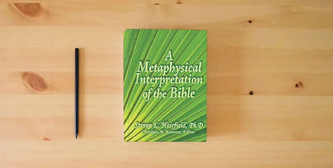 The book A Metaphysical Interpretation of the Bible} is on the table