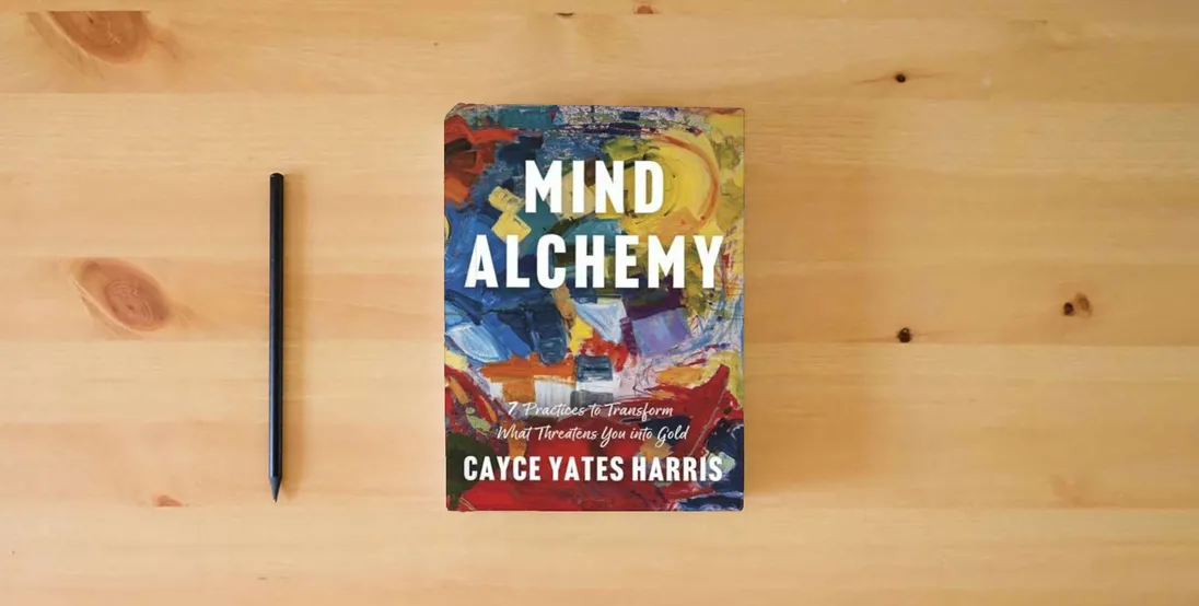 The book Mind Alchemy: 7 Practices to Transform What Threatens You into Gold} is on the table
