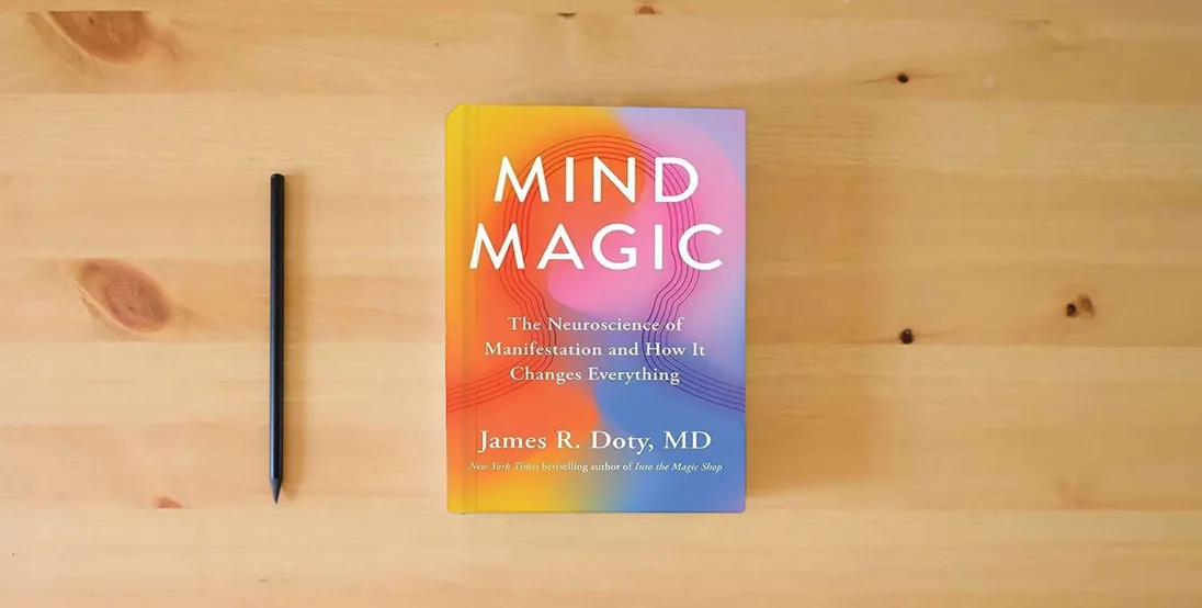 The book Mind Magic: The Neuroscience of Manifestation and How It Changes Everything} is on the table