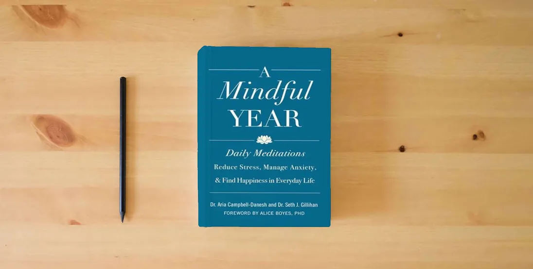 The book A Mindful Year: Daily Meditations: Reduce Stress, Manage Anxiety, and Find Happiness in Everyday Life} is on the table