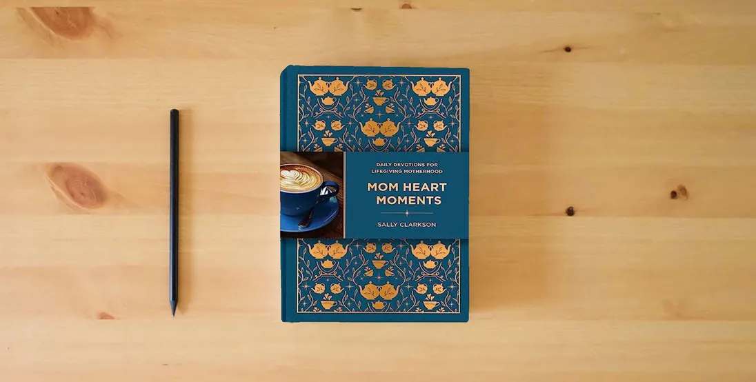 The book Mom Heart Moments: Daily Devotions for Lifegiving Motherhood} is on the table