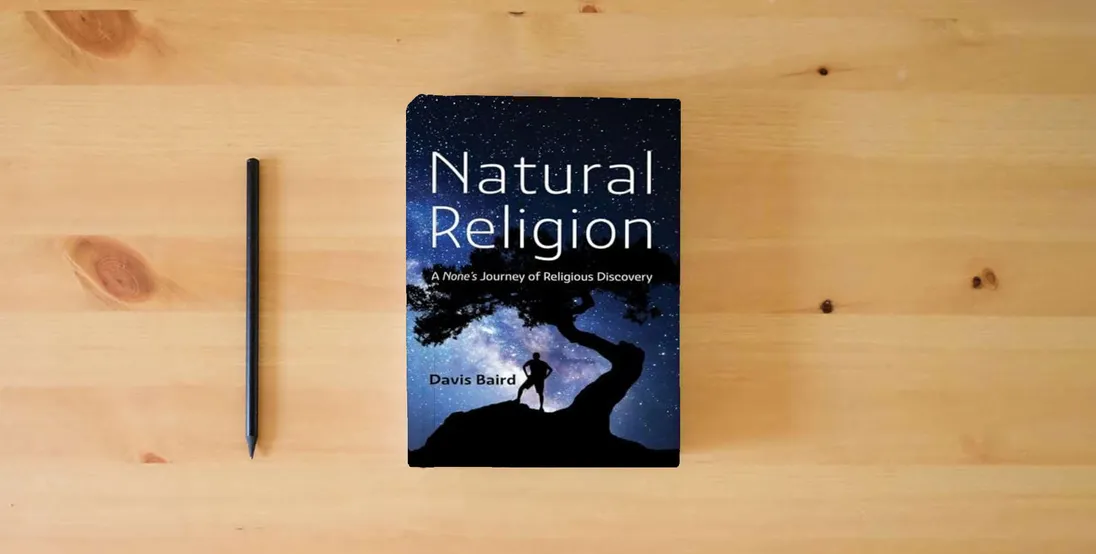 The book Natural Religion: A None's Journey of Religious Discovery} is on the table