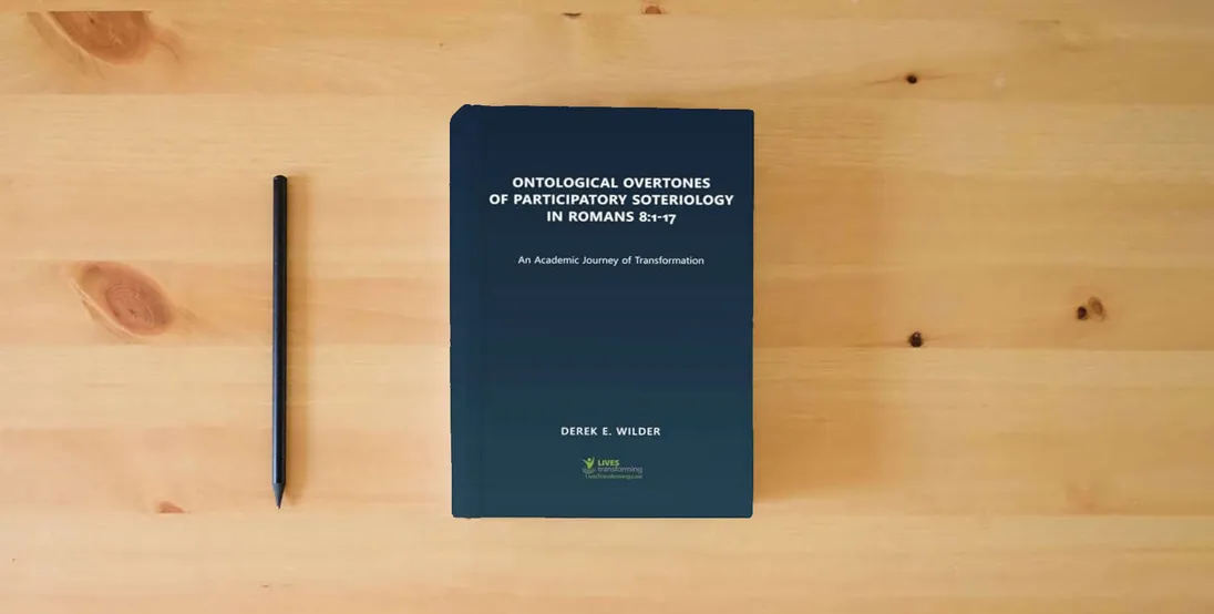 The book Ontological Overtones of Participatory Soteriology in Romans 8:1-17: An Academic Journey of Transformation} is on the table