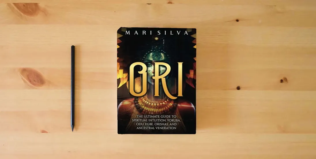 The book Ori: The Ultimate Guide to Spiritual Intuition, Yoruba, Odu, Egbe, Orishas, and Ancestral Veneration (African Spirituality)} is on the table
