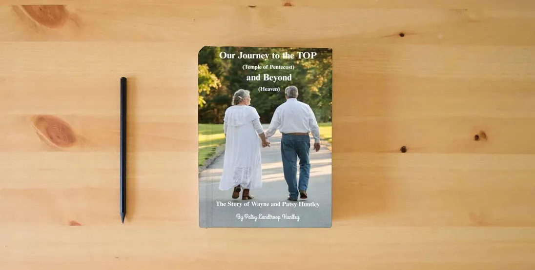 The book Our Journey to the TOP and Beyond: The Story of Wayne and Patsy Huntley} is on the table