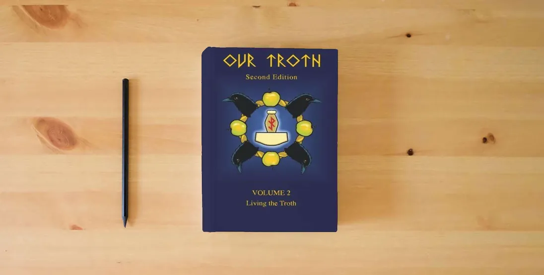 The book Our Troth: Living the Troth} is on the table