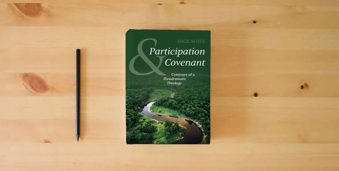 The book Participation and Covenant: Contours of a Theodramatic Theology} is on the table