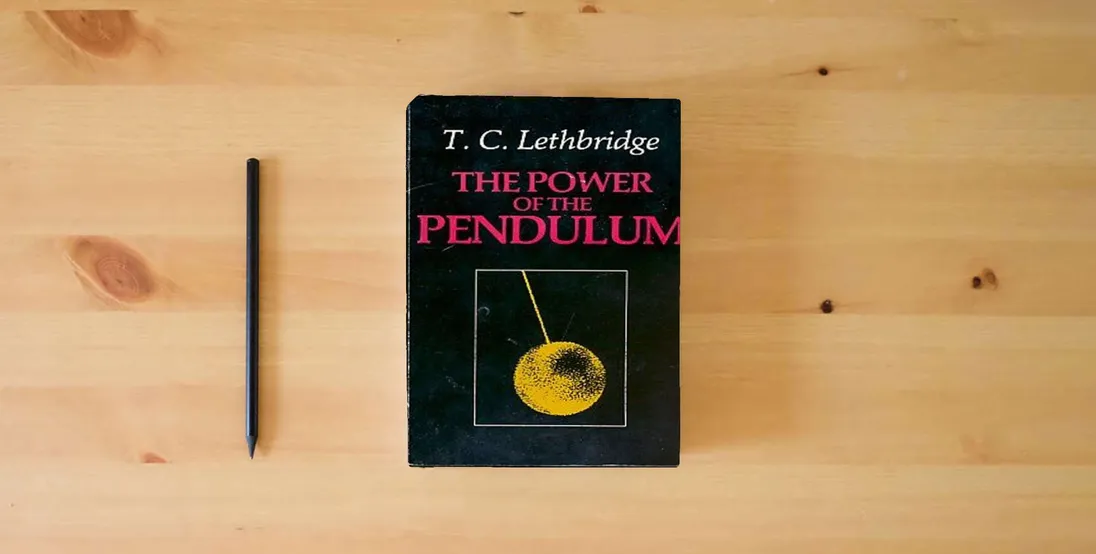 The book Power of the Pendulum} is on the table