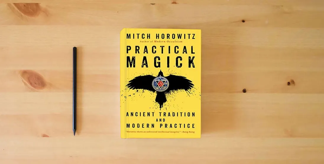 The book Practical Magick: Ancient Tradition and Modern Practice} is on the table