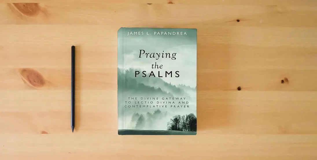 The book Praying the Psalms: The Divine Gateway to Lectio Divina and Contemplative Prayer} is on the table