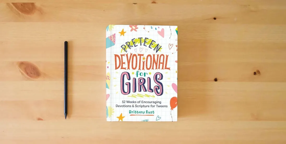 The book Preteen Devotional for Girls: 52 Weeks of Encouraging Devotions and Scripture for Tweens} is on the table