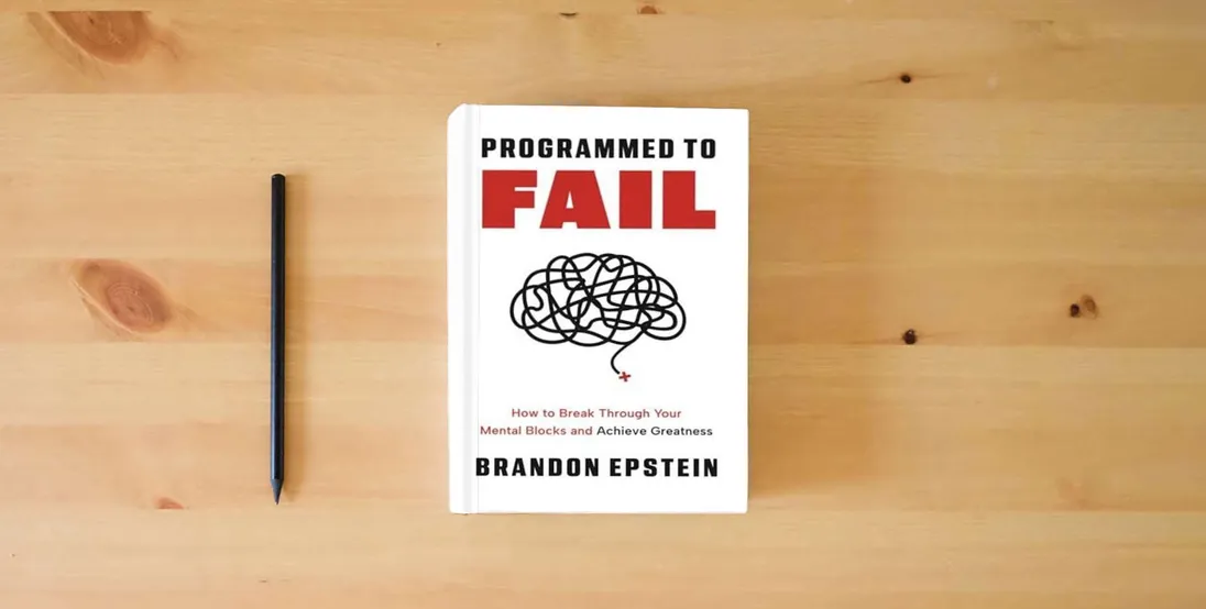 The book Programmed to Fail: How to Break Through Your Mental Blocks and Achieve Greatness} is on the table