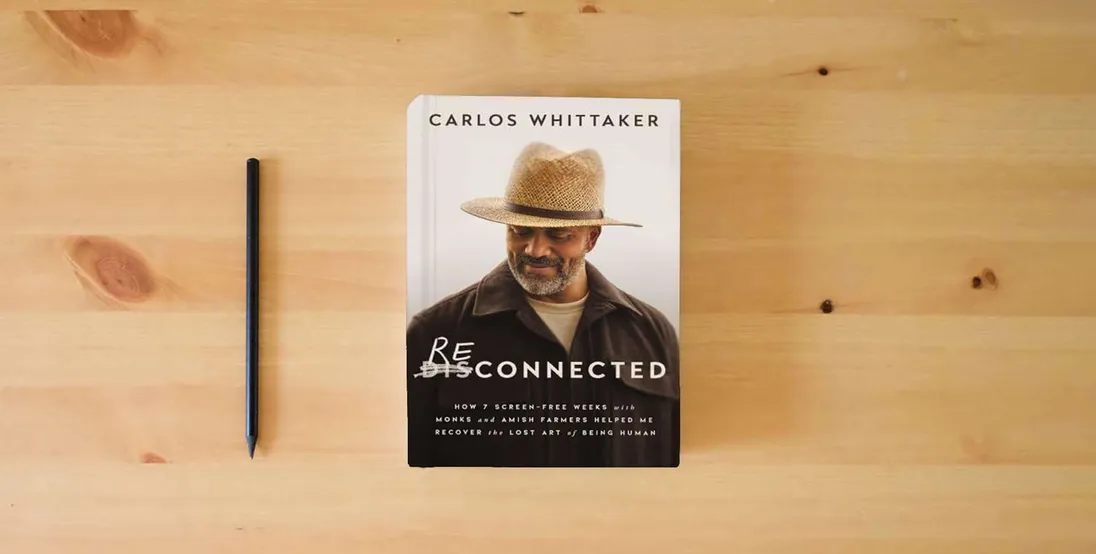 The book Reconnected: How 7 Screen-Free Weeks with Monks and Amish Farmers Helped Me Recover the Lost Art of Being Human} is on the table