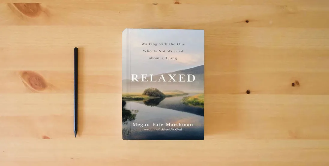 The book Relaxed: Walking with the One Who Is Not Worried about a Thing} is on the table
