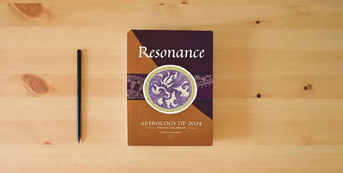 The book Resonance: Astrology of 2024 Cosmic Calendar} is on the table