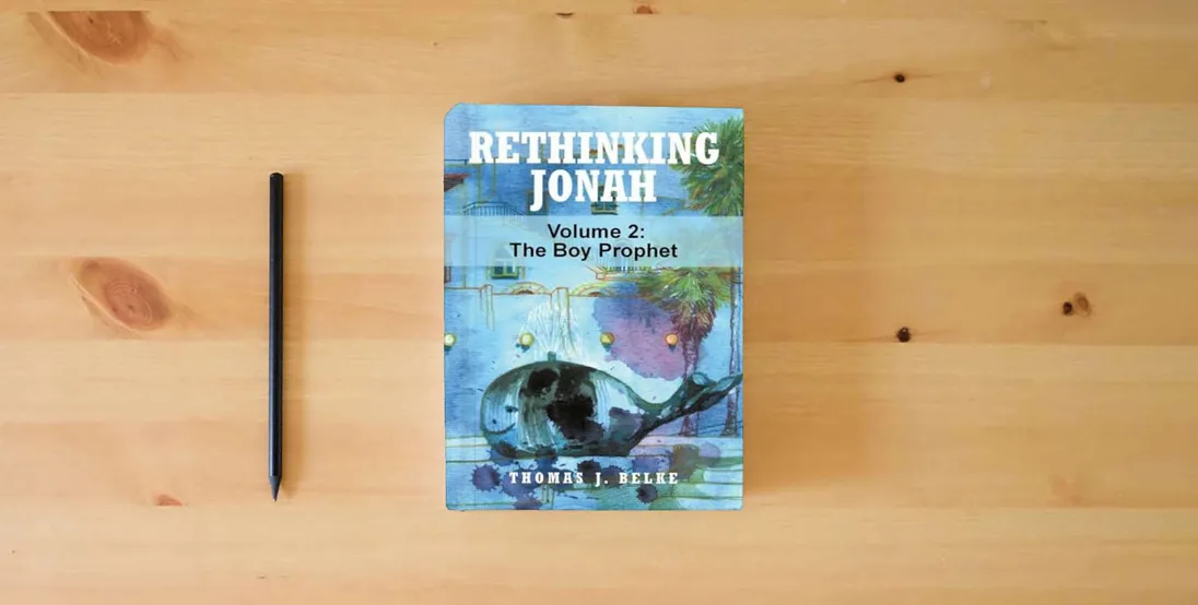 The book Rethinking Jonah: The Boy Prophet (VOLUME 2)} is on the table