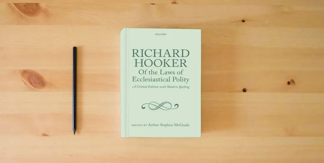 The book Richard Hooker, Of the Laws of Ecclesiastical Polity: A Critical Edition with Modern Spelling} is on the table