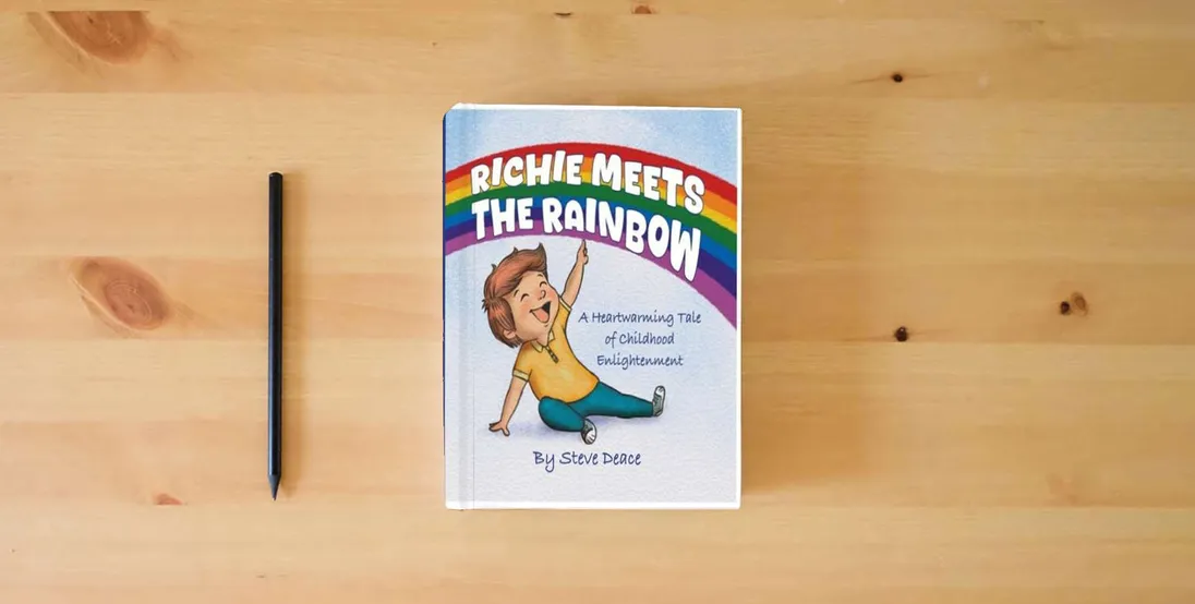 The book Richie Meets The Rainbow: A Heartwarming Tale of Childhood Enlightenment} is on the table