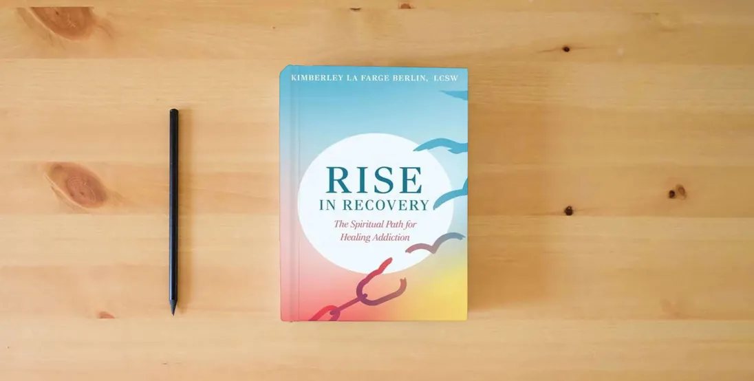 The book Rise in Recovery: The Spiritual Path for Healing Addiction} is on the table