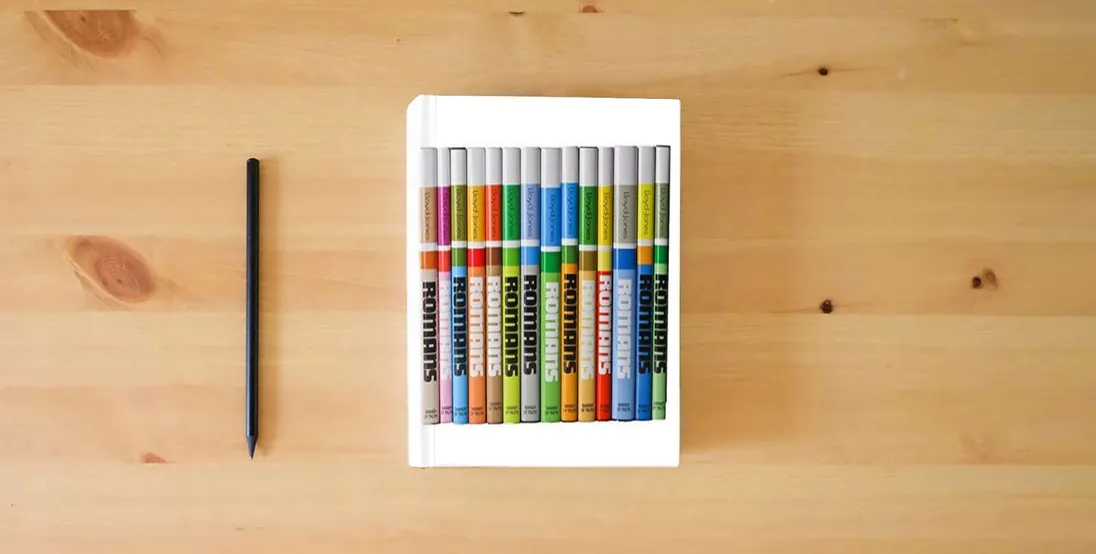 The book Romans (14 Volume Set)} is on the table
