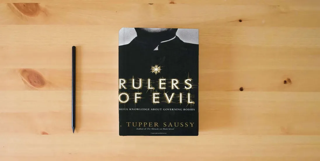The book Rulers of Evil: Useful Knowledge about Governing Bodies} is on the table