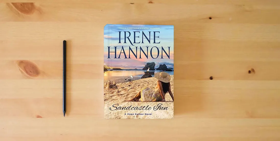 The book Sandcastle Inn: A Hope Harbor Novel} is on the table