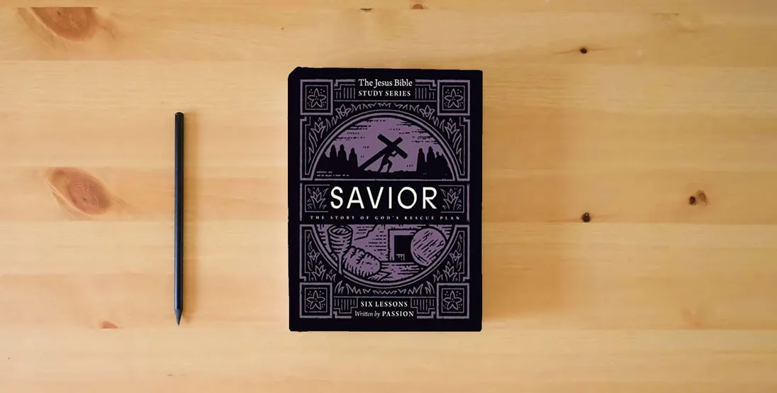 The book Savior Bible Study Guide: The Story of God’s Rescue Plan (Jesus Bible Study Series)} is on the table