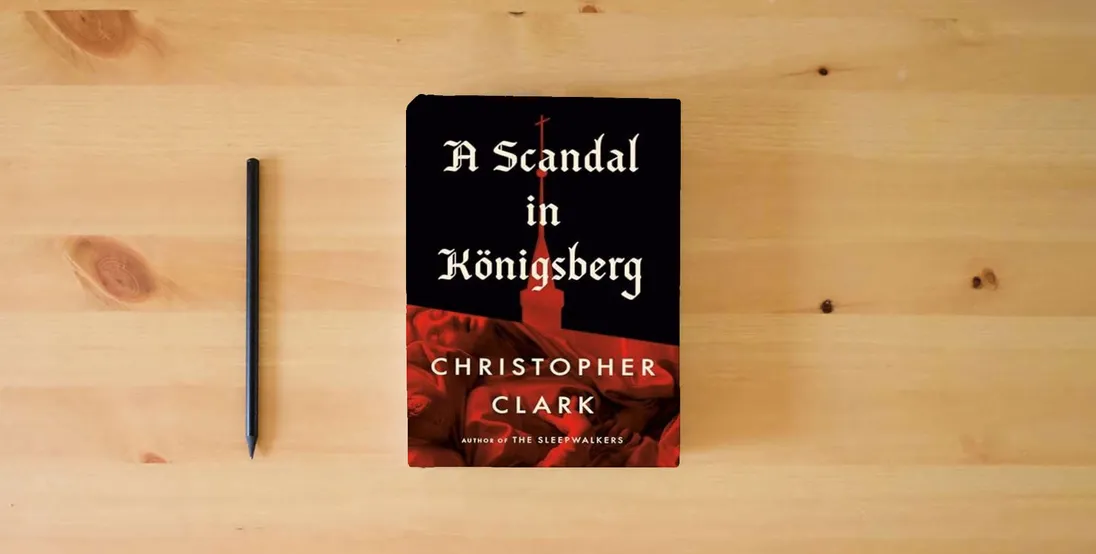 The book A Scandal in Königsberg} is on the table