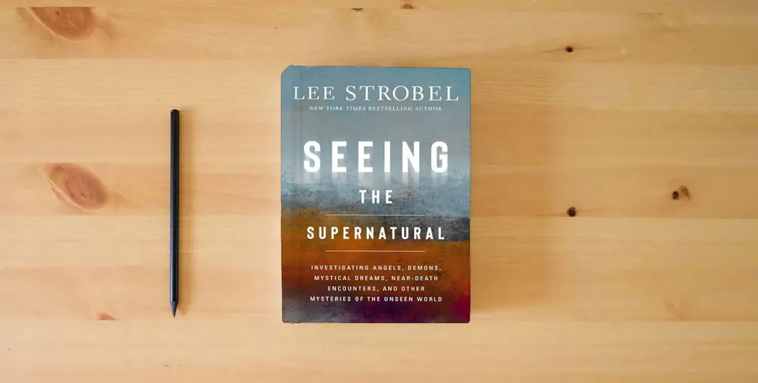 The book Seeing the Supernatural: Investigating Angels, Demons, Mystical Dreams, Near-Death Encounters, and Other Mysteries of the Unseen World} is on the table