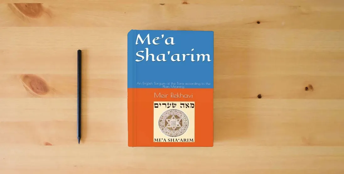 The book Me՚a Shaՙarim: An English Targum of the Tora according to the Plain Meaning} is on the table